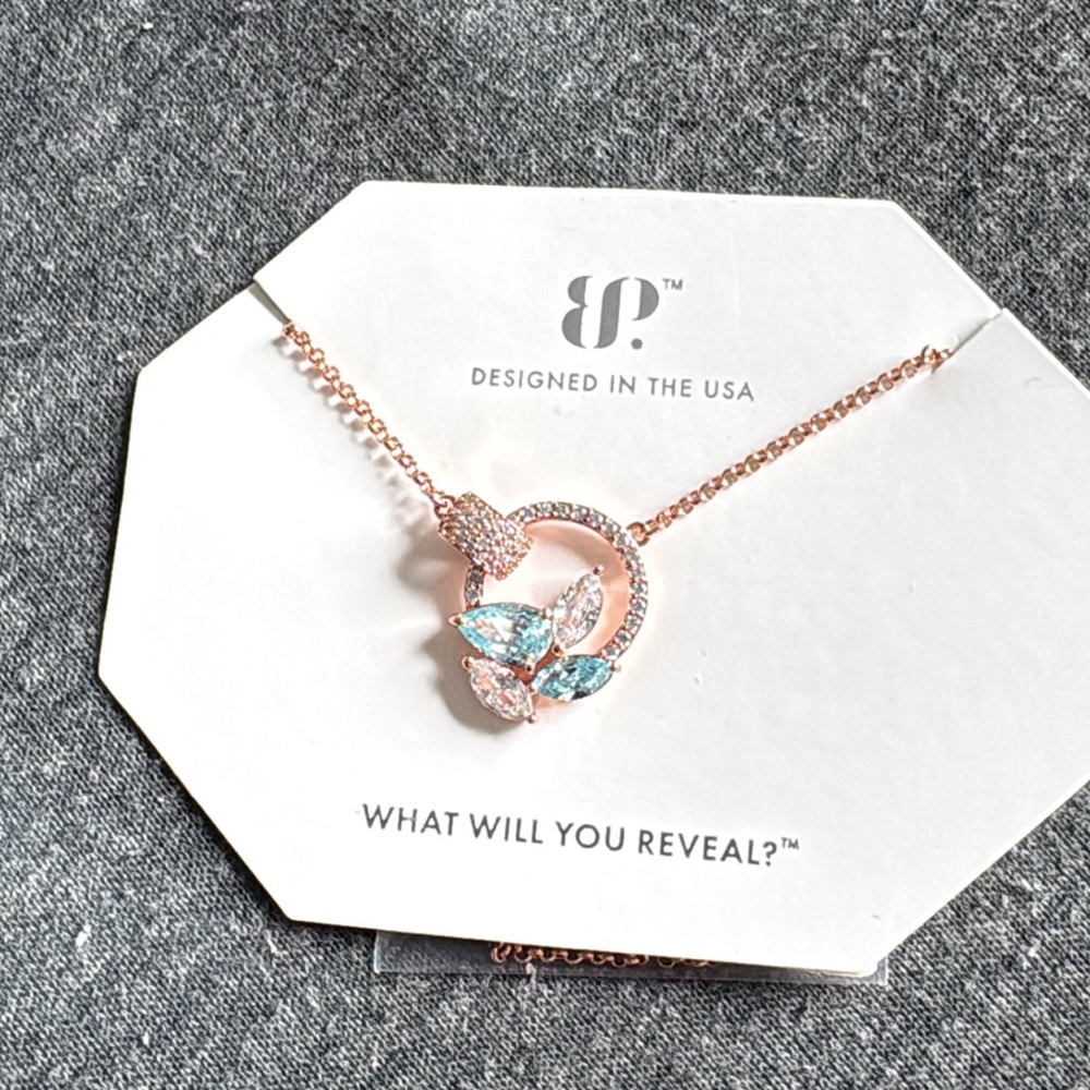 Elegant Gold Necklace with Blue and Clear Accents